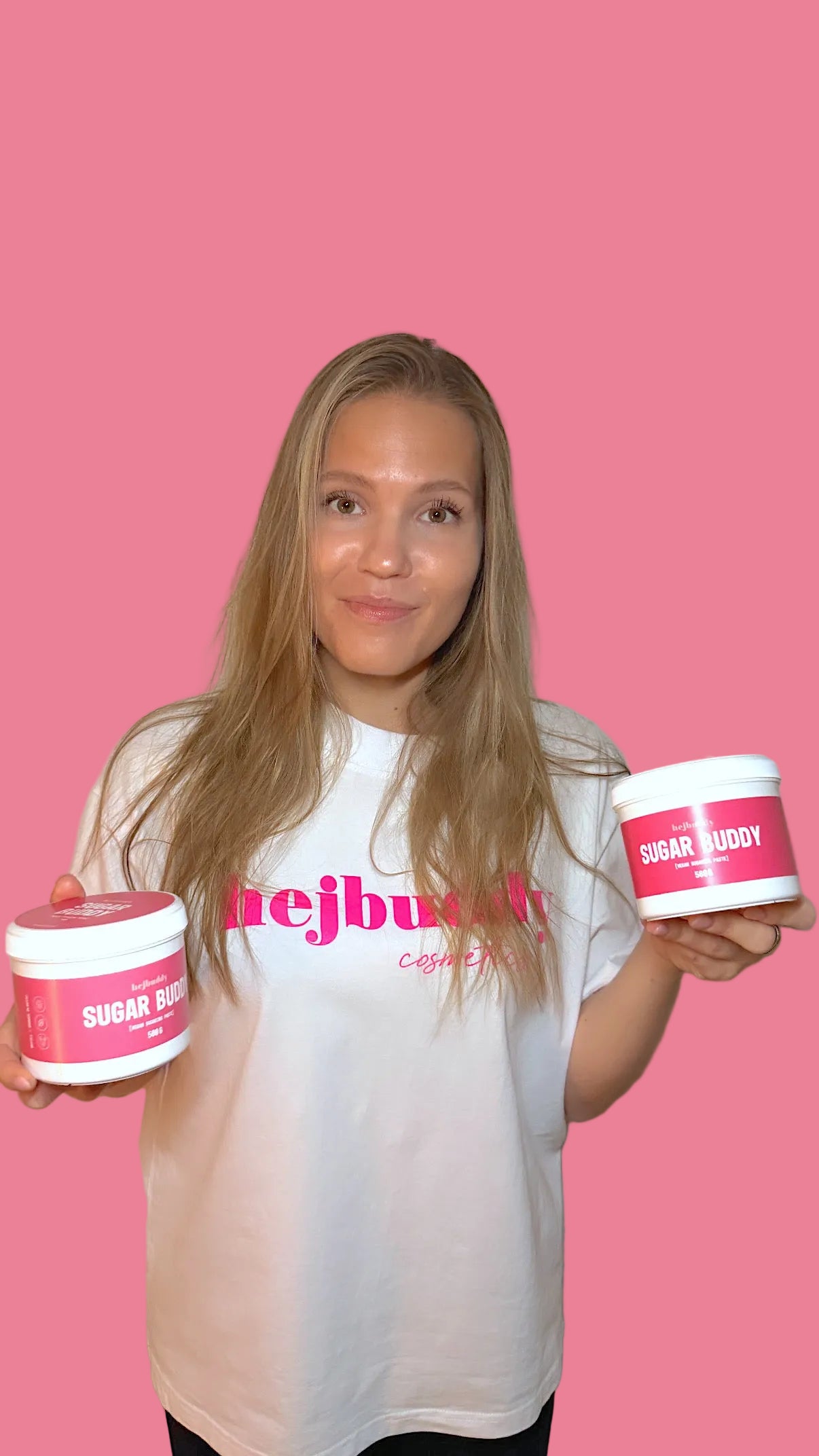 Woman keeping two HejBuddy-brand Sugar Buddy jars on hands